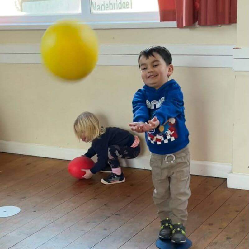 Little kids playing ball sports