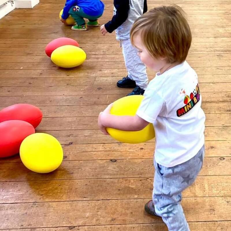 Little kids playing ball sports