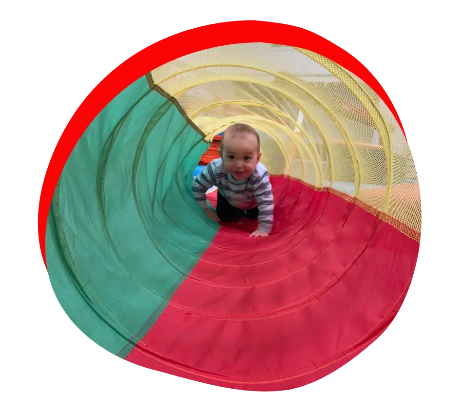 toddler crawling through tunnel